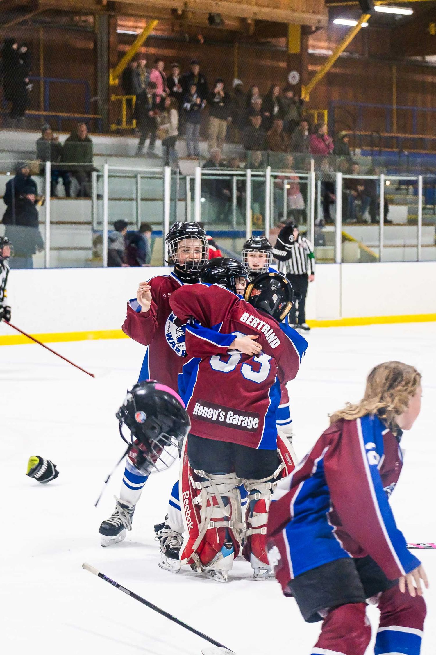 Celebrate the win in a high-intensity hockey action shot during a live game at Earl Armstrong Arena, Gloucester, Ontario