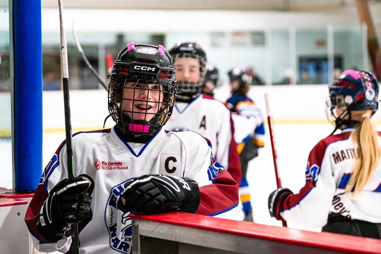 On the bench moment shot during a live game in Ottawa, Ontario Player enjoying the game and laughing with coaches