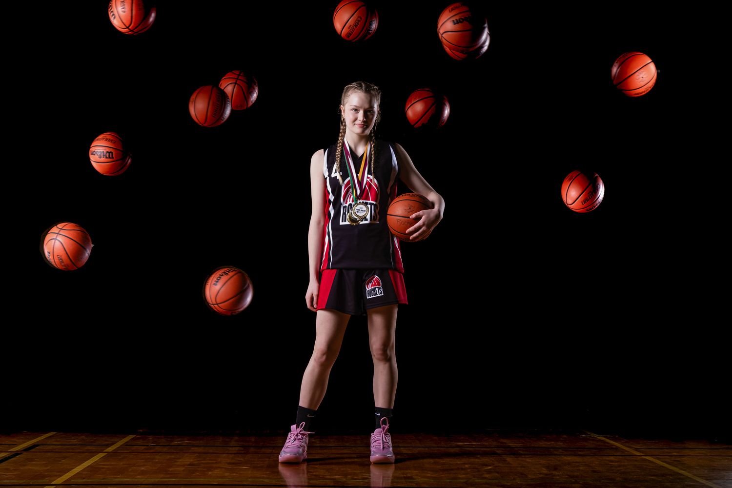 Elite Basketball team media day portrait with dramatic lighting and on-ice smoke effects in Eastern Ontario by The Show Sports Media