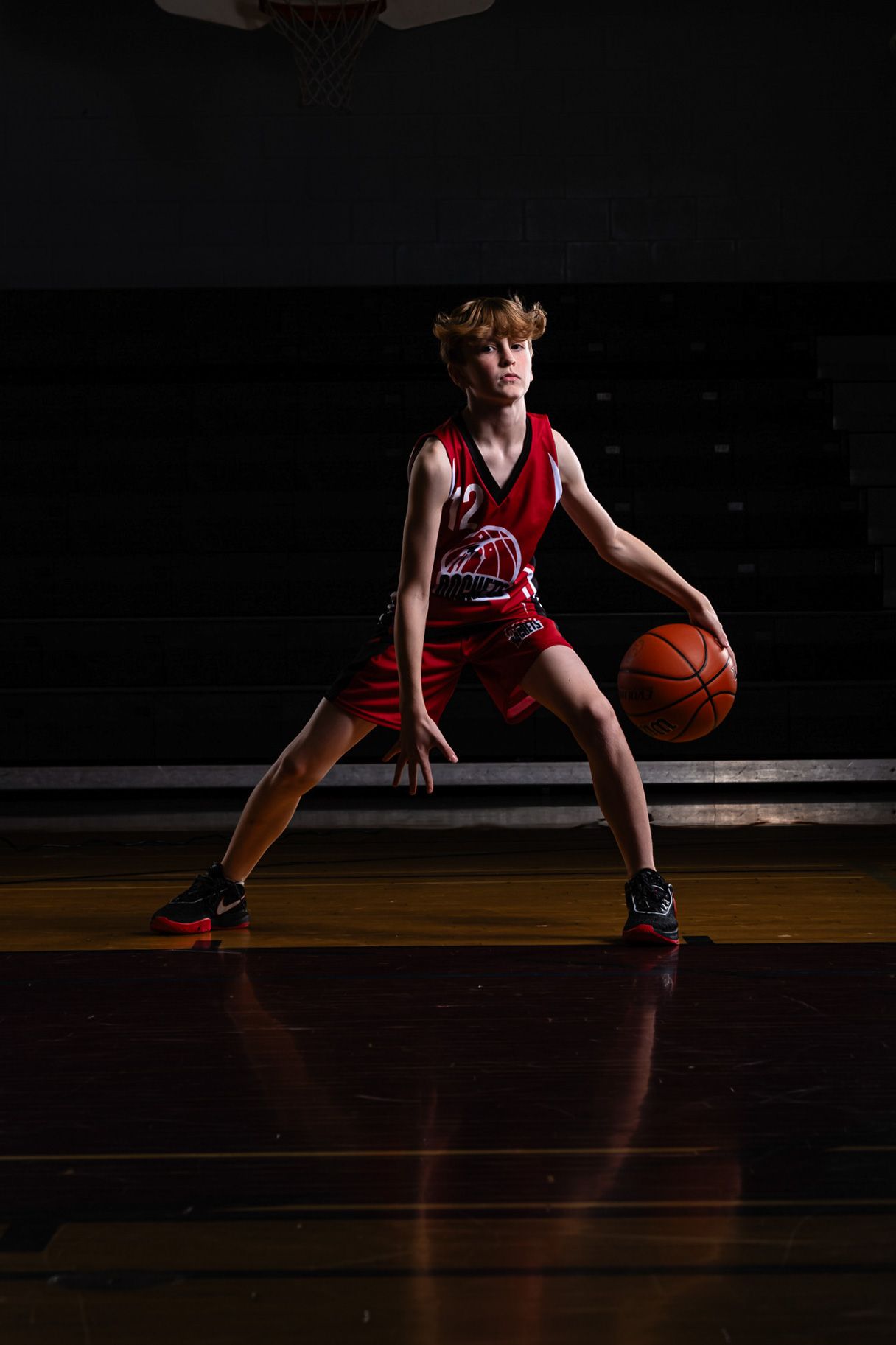 Cinematic basketball action portrait using dramatic studio lighting and effects