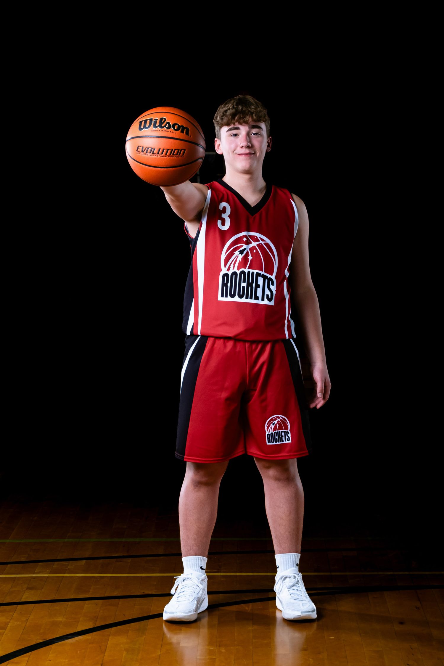 Portrait of a Basketball Player by The Show Sports Media a female owned Sports Photography Business  in Ottawa