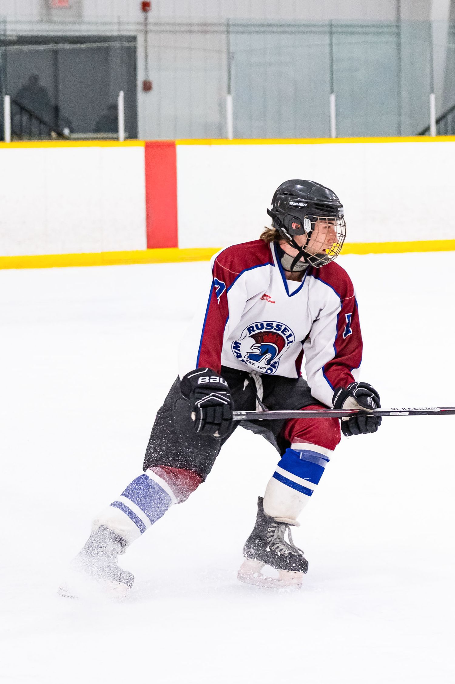 High-intensity hockey action shot by The Show Sports Media during a live game in Russell