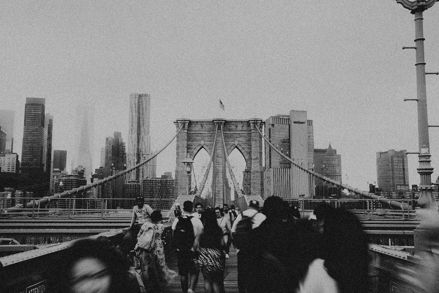 Black and white photograph of Brooklyn Bridge in New York City by Jake Burgess