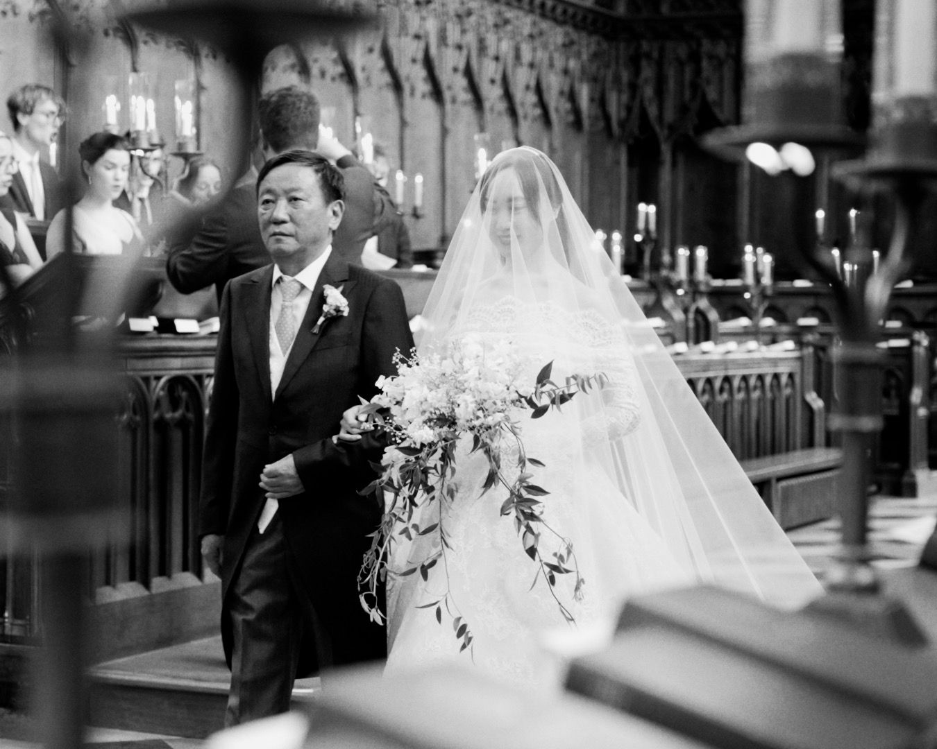 Bride walking down the aisle with father at luxury Oxford city wedding