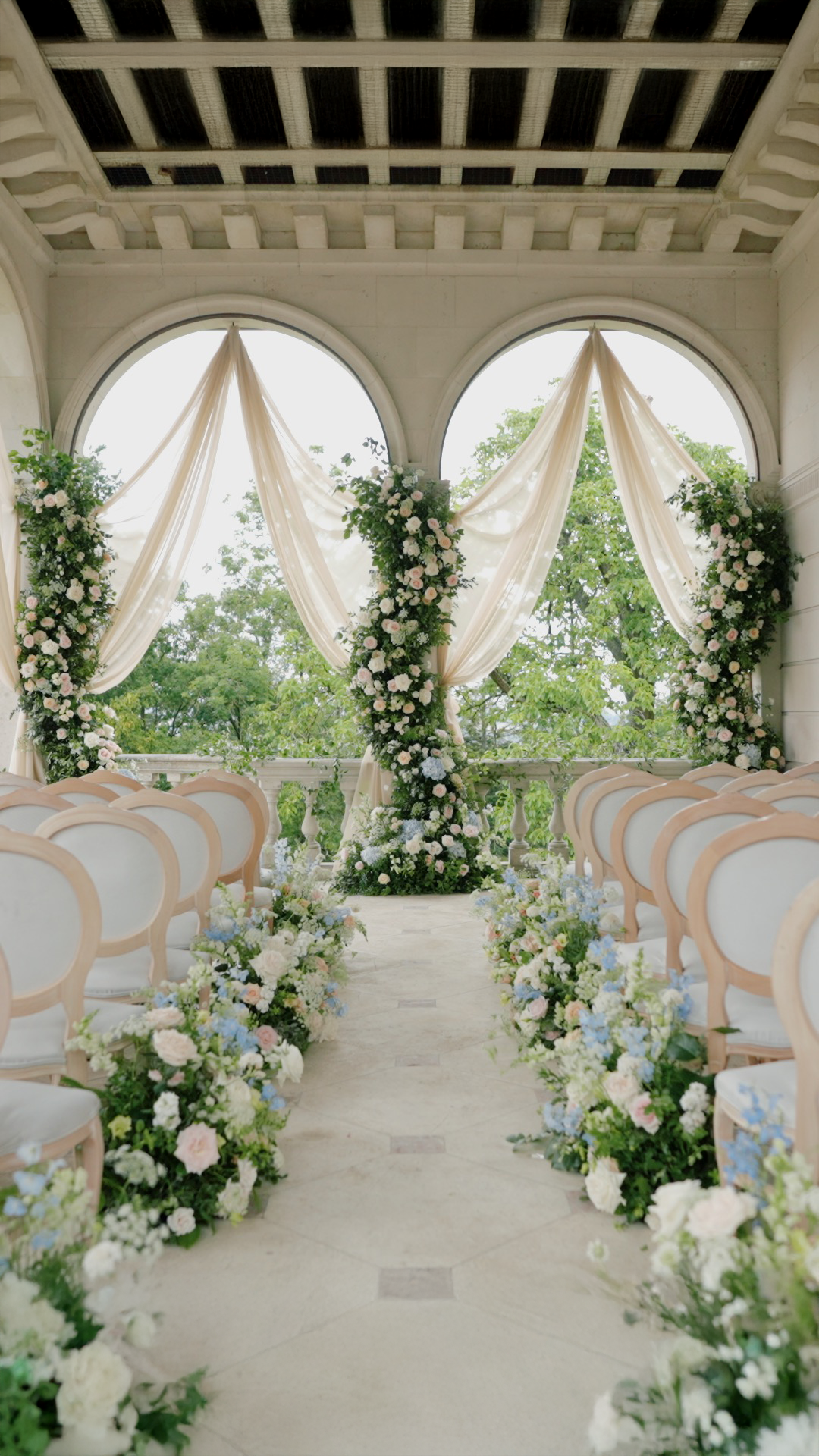 Outdoor wedding ceremony pergola at Cliveden House luxury UK wedding venue