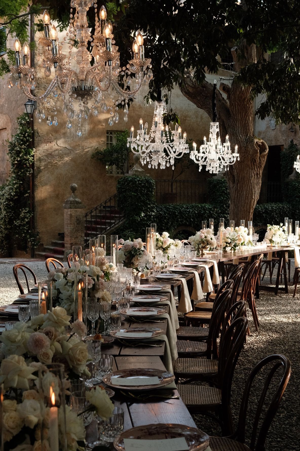 Elegant wedding breakfast tablescape at Borgo Stomennano during a luxury Italian destination wedding