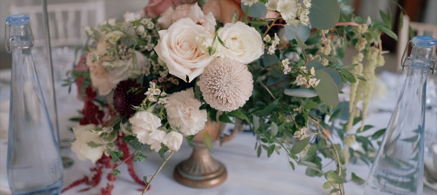 Luxury Cotswolds wedding flowers on a tablescape at Ashridge House Wedding Venue