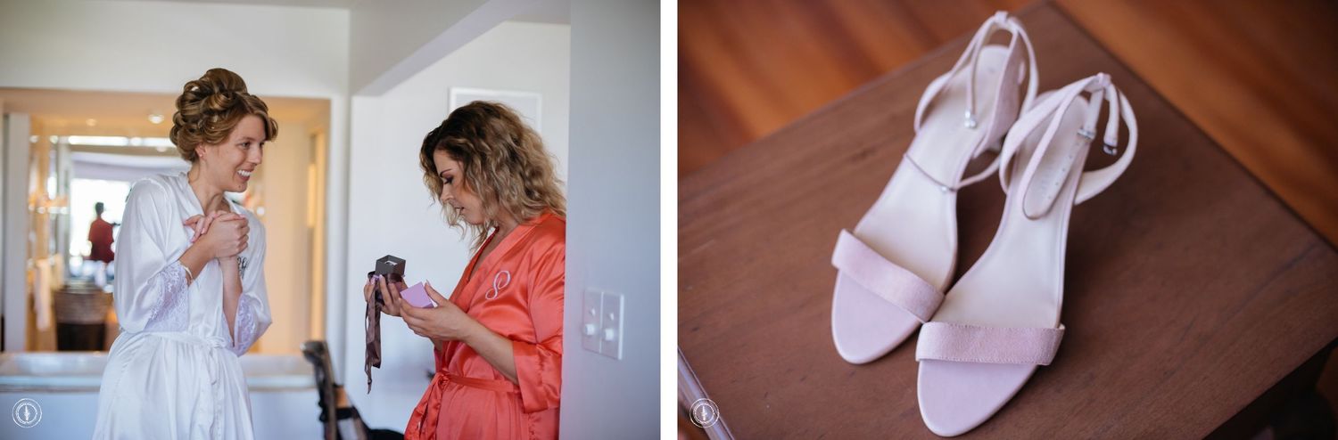 Wedding preparation scene with details of white shoes and robes.