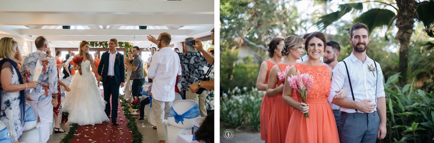 Elegant wedding reception with guests in formal attire and coral bridesmaids dresses.