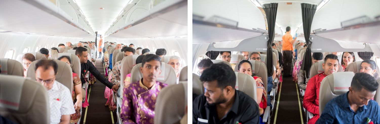 Interior view of passengers seated in commercial airplane cabin aisles.