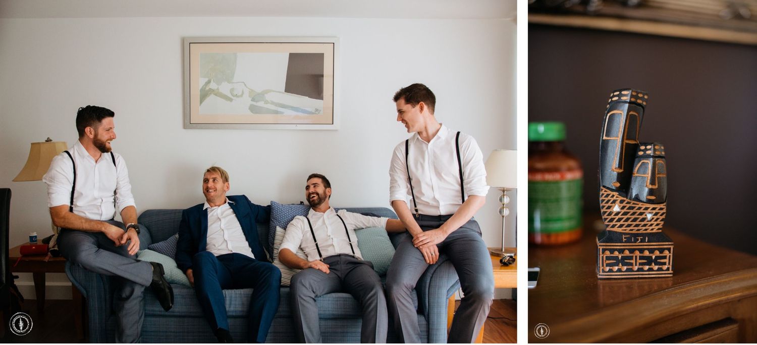 Wedding party candid photo of groomsmen relaxing on couch beside decorative lantern.