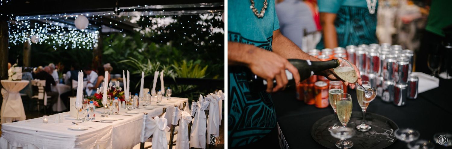 Elegant wedding reception setup with champagne glasses and dining tables decorated in white linens.