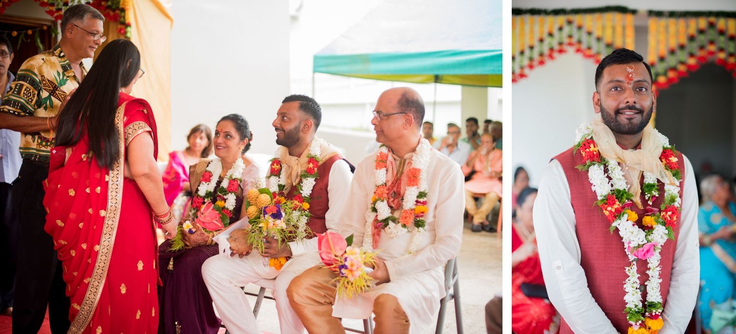 Group of wedding guests participating in traditional Indian ceremony under decorated canopy.