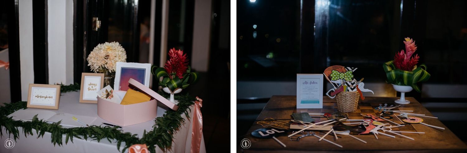 Wedding reception details showing guest book table and decorative elements.