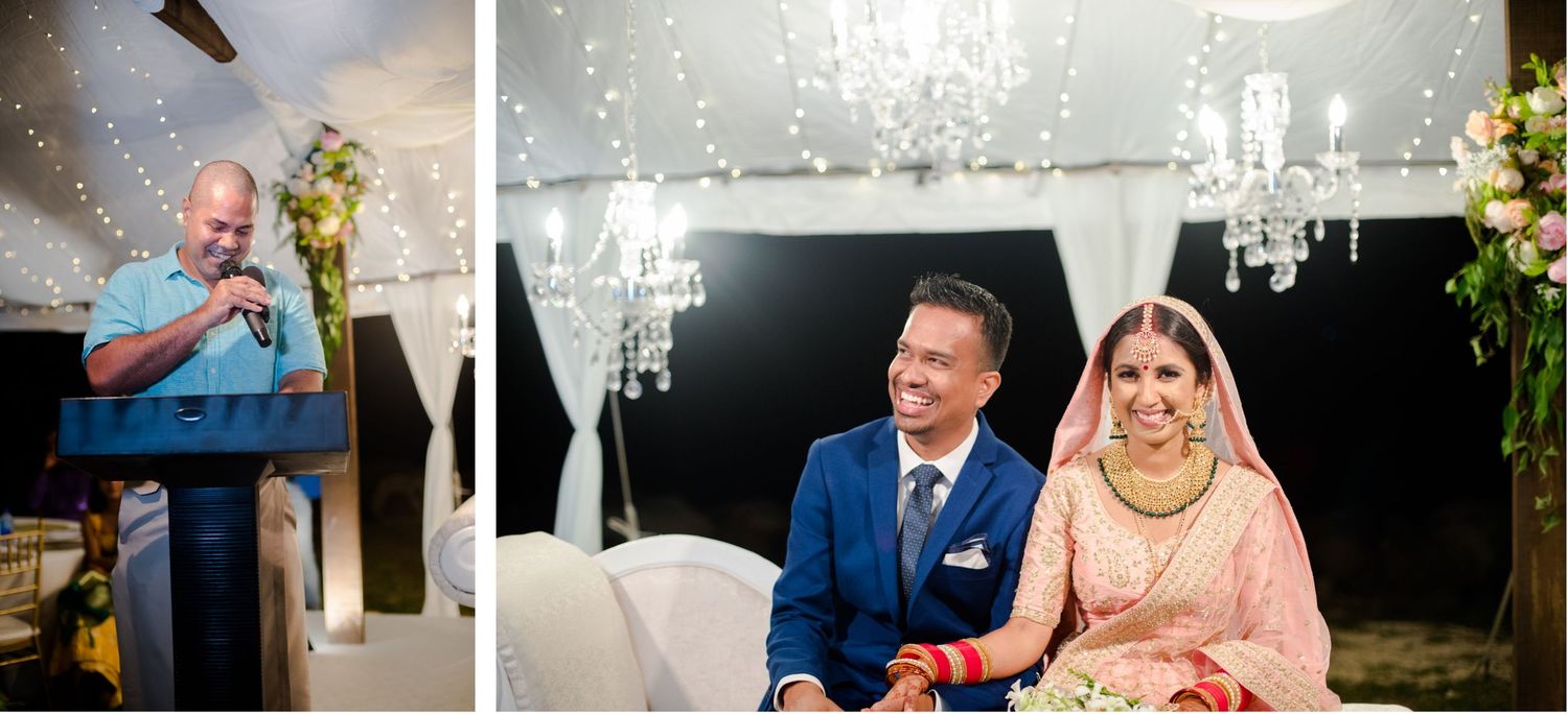 Guest gives a heartfelt speech at an elegant wedding reception under white tent decor and chandeliers.
