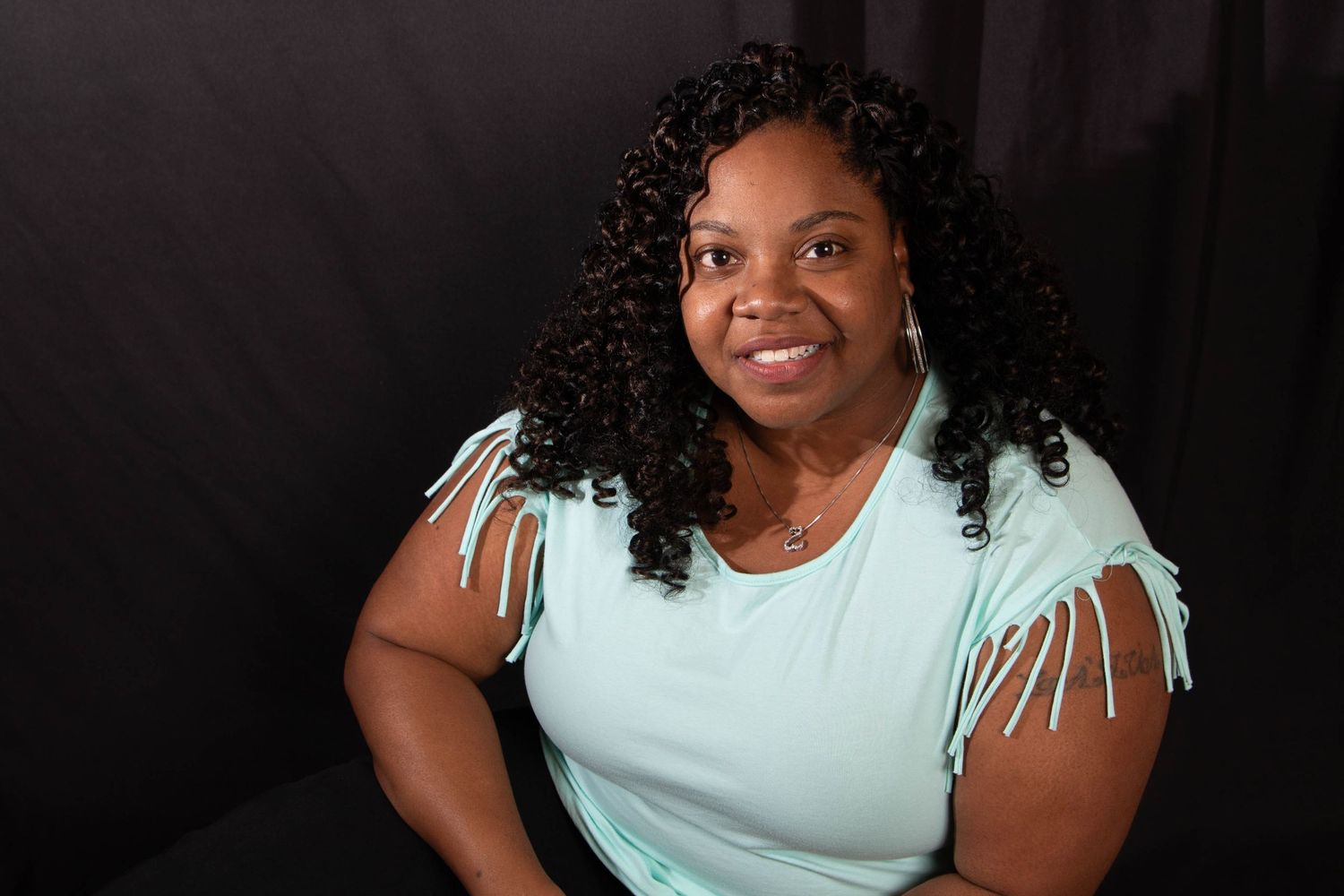 Image of a woman, black background