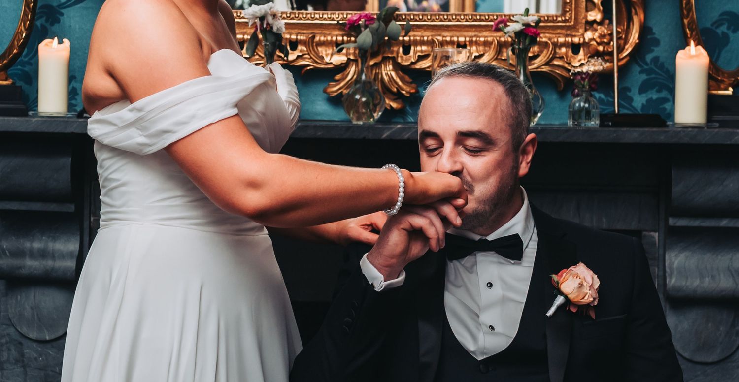 Romantic wedding couple sharing an intimate moment during their first dance at an elegant reception.