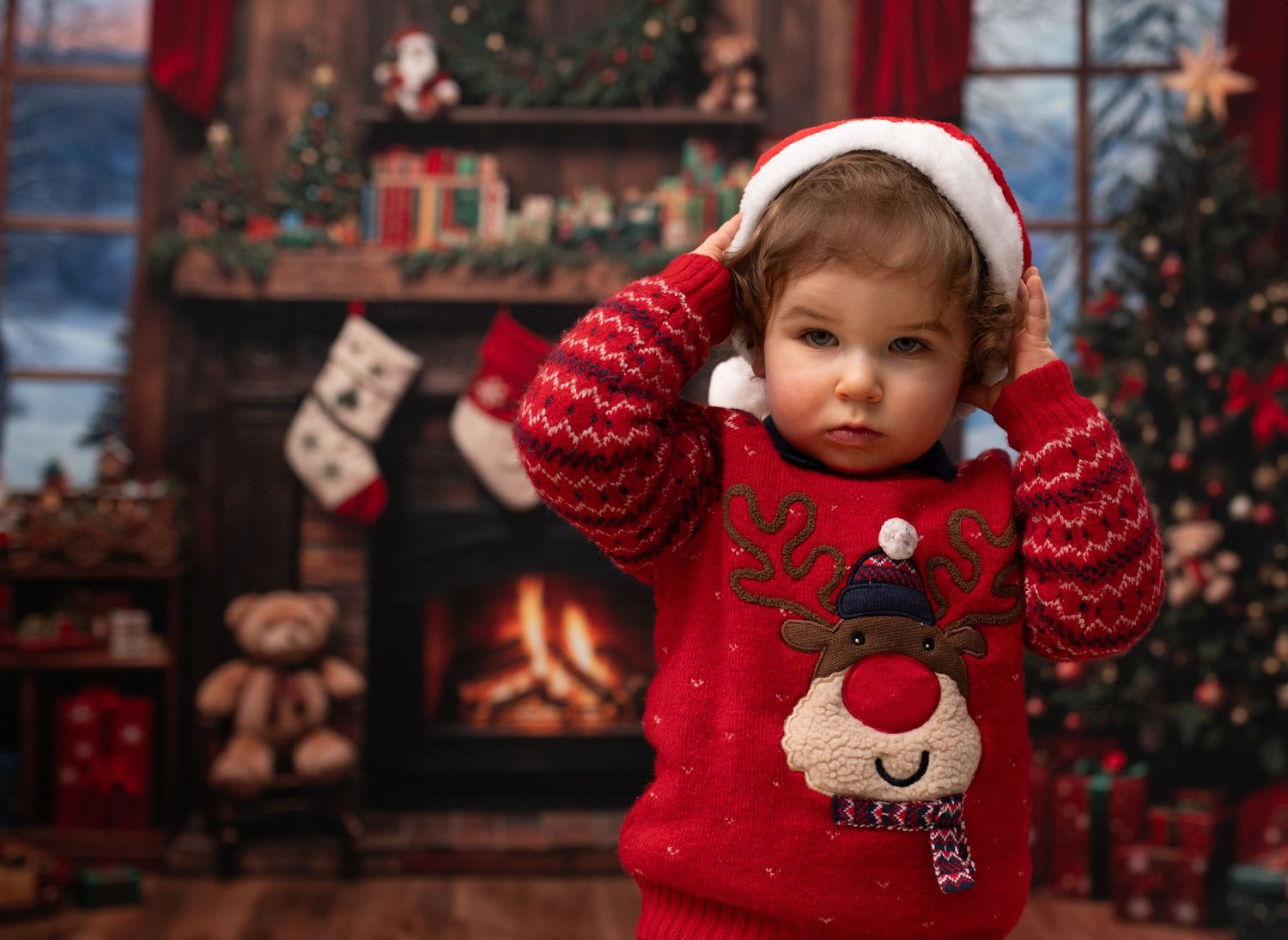 A series of holiday photos showing a child in a red reindeer sweater posing in front of Christmas decorations.