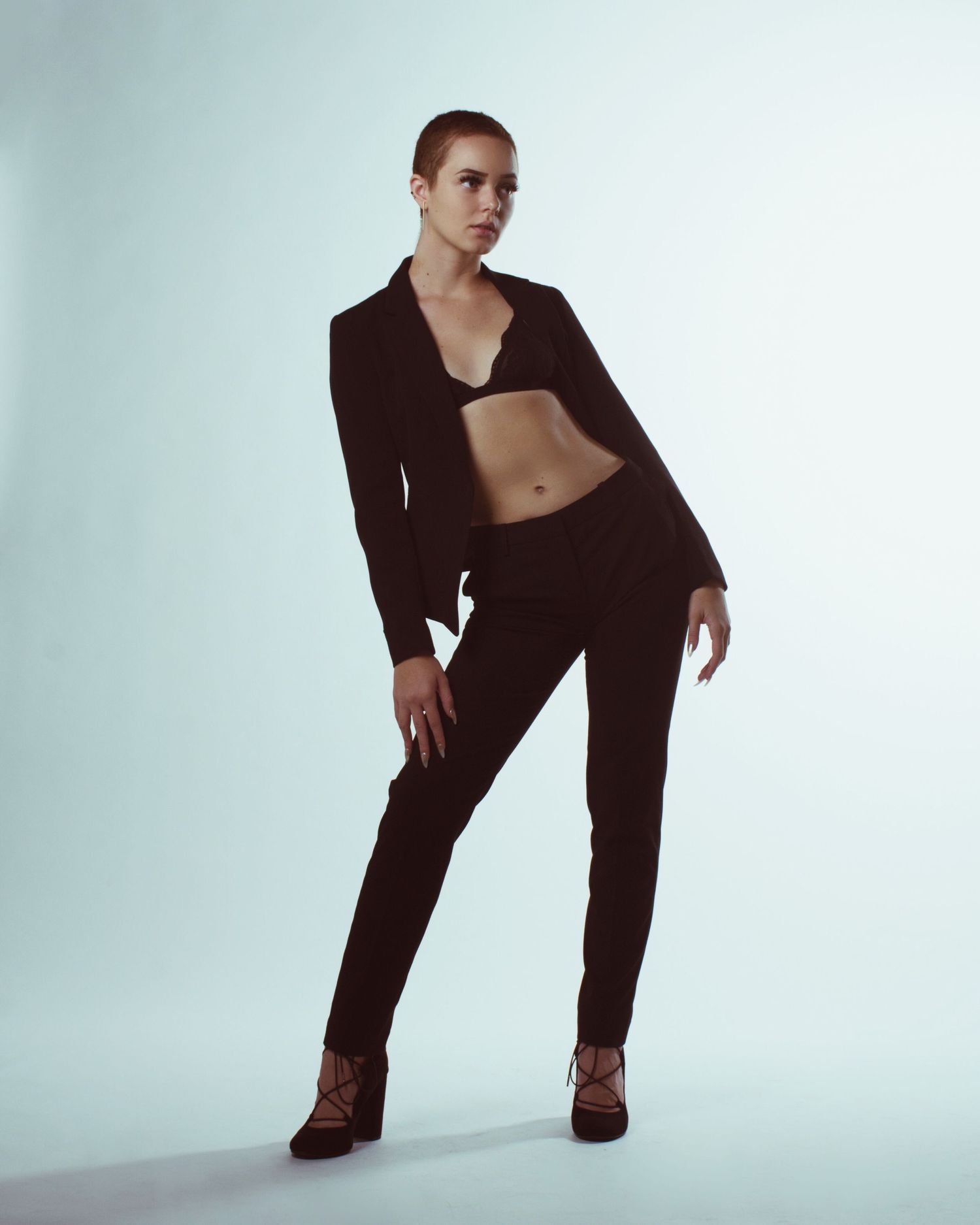 Modern fashion series showing dynamic poses in brown outfit against white background.