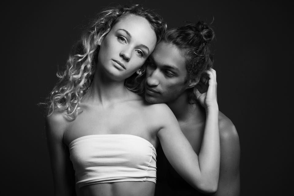 Dramatic black and white portrait series featuring romantic couples in intimate poses.