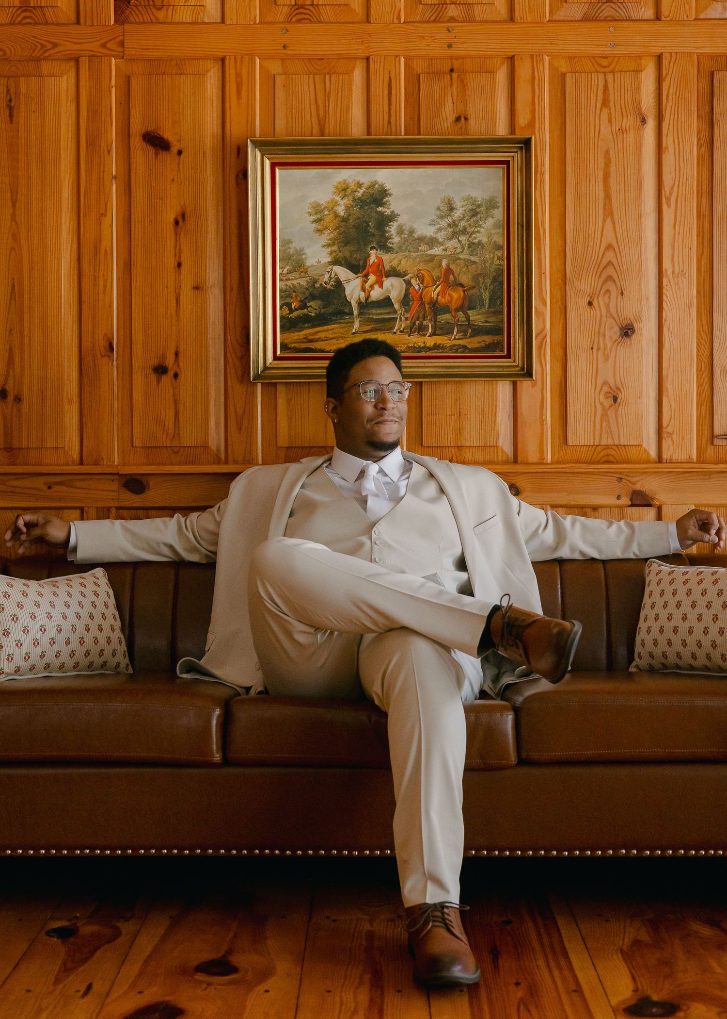 grooms portrait in a wooden state room by an intimate wedding and elopement photographer, photographing couples across North Carolina candid
