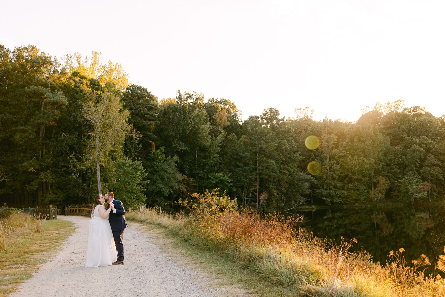 Candid Golden Hour Portraits, romantic fall wedding in Raleigh at Durant Nature Preserve, captured by Asheville photographer Kalli Hicks.