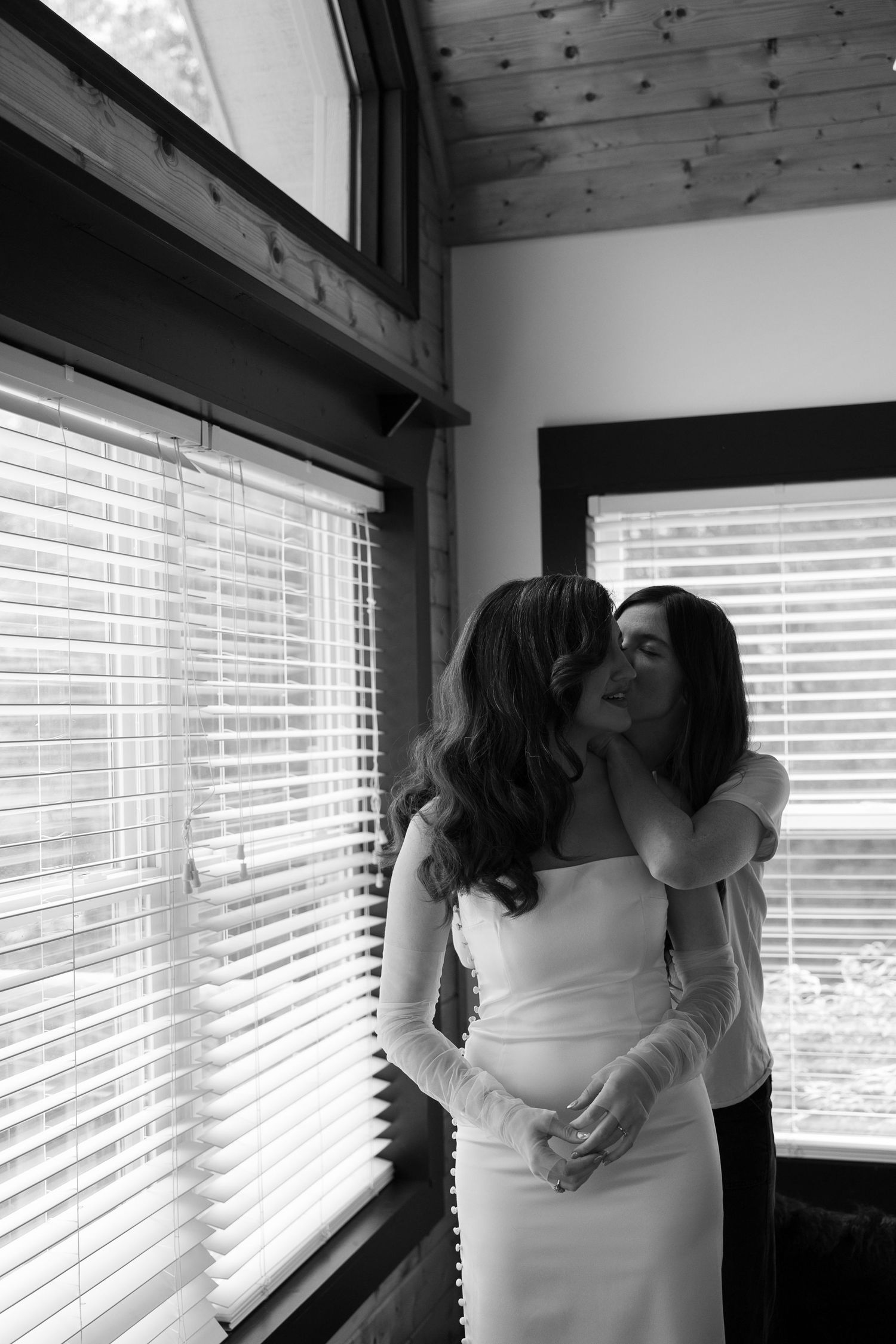 Intimate wedding and elopement in Asheville, North Carolina, capturing candid and authentic moments while the bride got ready in an Airbnb