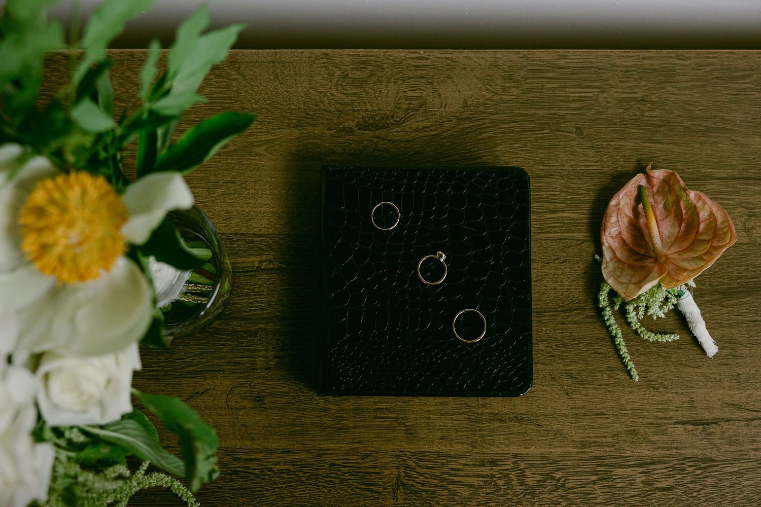Intimate wedding and elopement in Asheville, North Carolina, capturing fine art detail ring shots while the bride got ready in an Airbnb