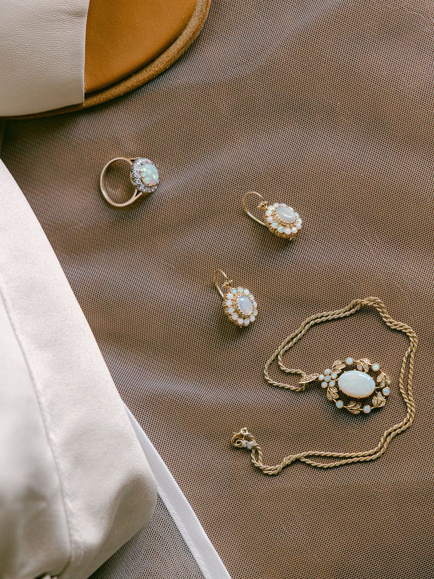 Intimate wedding and elopement in Asheville, North Carolina, capturing fine art heirloom photographys while the bride got ready in an Airbnb