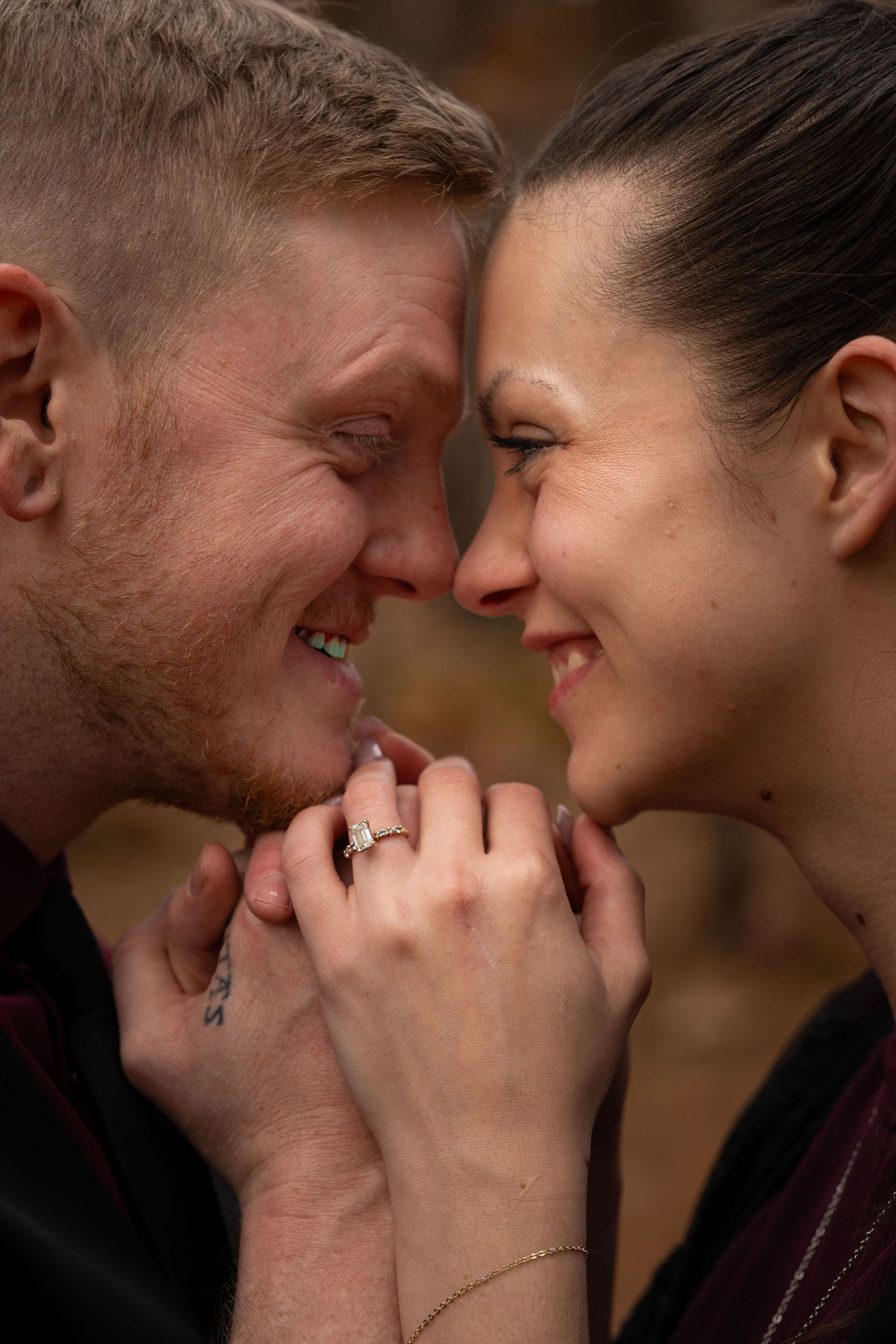 A romantic couple sharing an intimate moment with their faces close together in a series of connected photos.