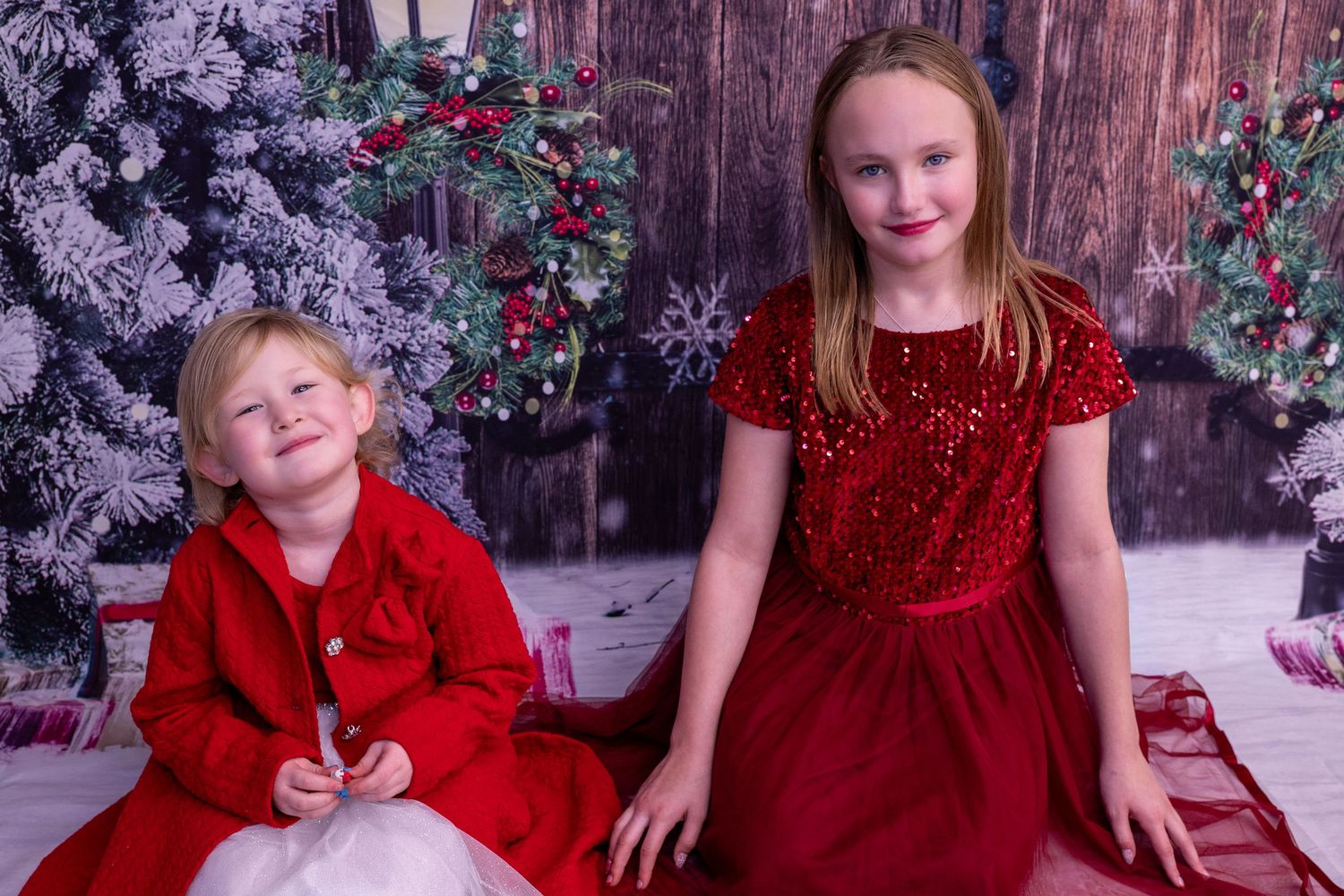 A collage of festive holiday photos featuring red dresses and Christmas decorations against a rustic backdrop.