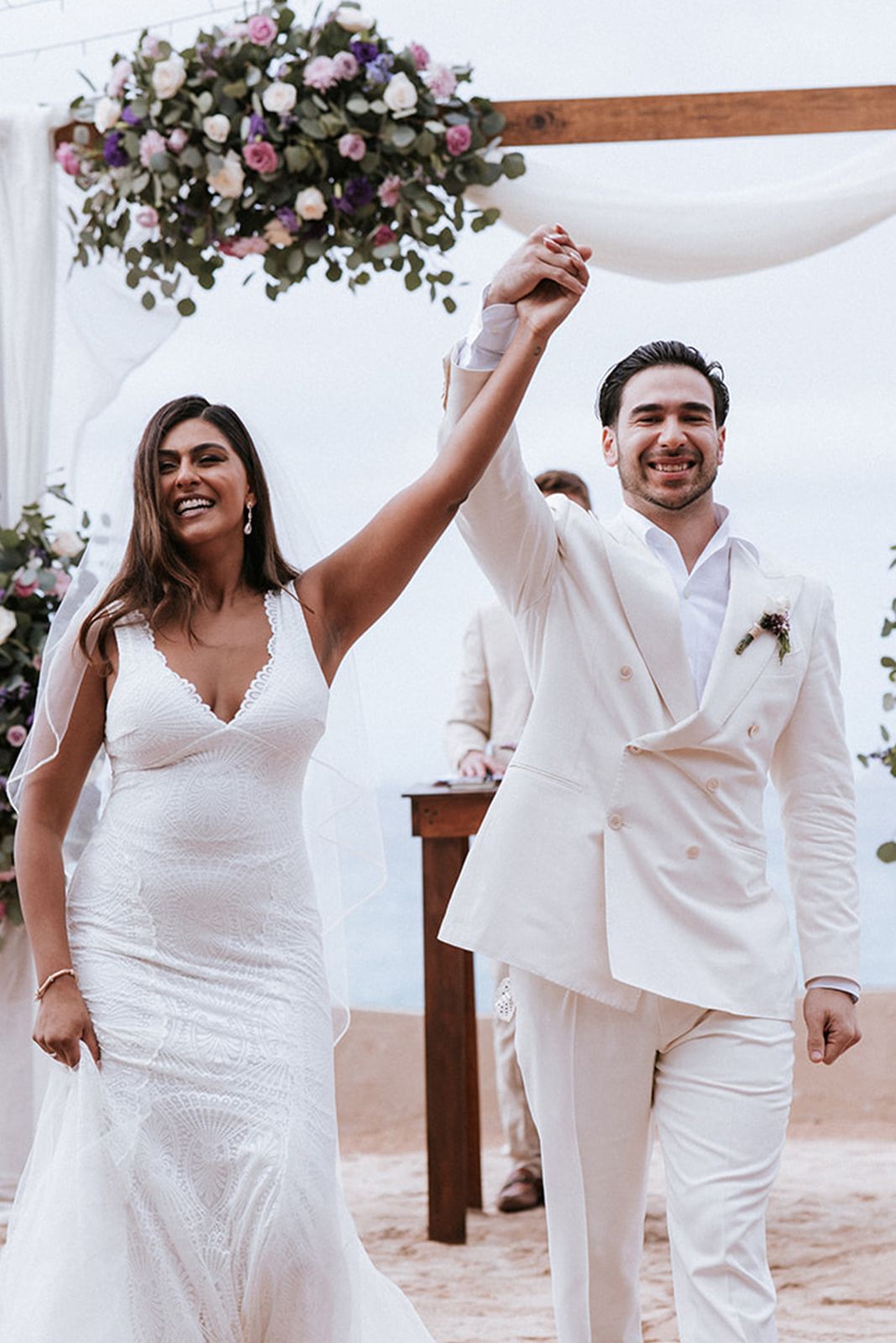 Just married couple celebrating their beach wedding in Puerto Vallarta, captured with elegance and emotion by photographer José Carrillo.