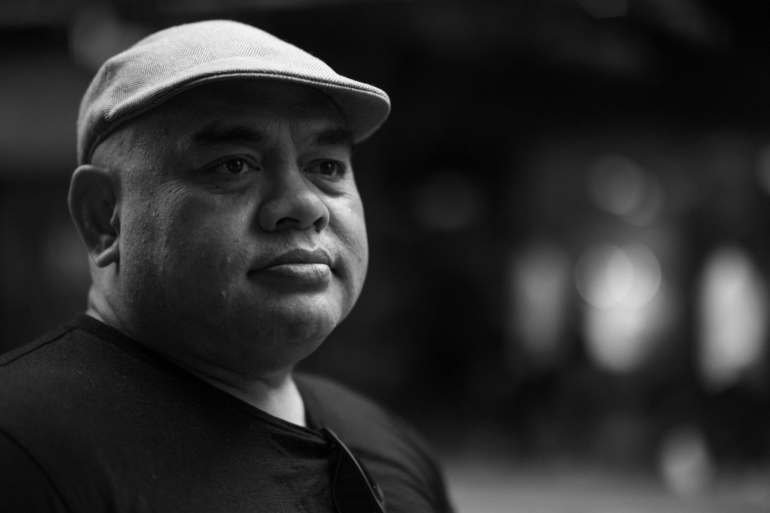 Portrait of Sydney photographer Lee Siteine, also known as Soy Latte Lee, in a black and white photograph.