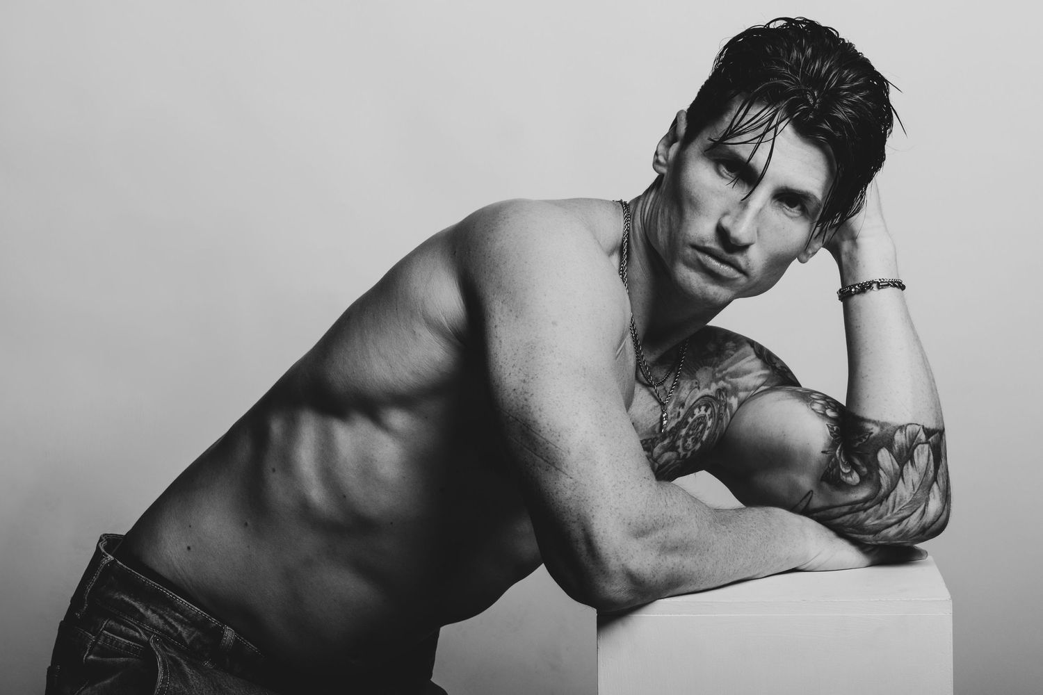 Studio portrait of James Morris in Sydney, photographed with dramatic black and white lighting by portrait photographer Lee Siteine.
