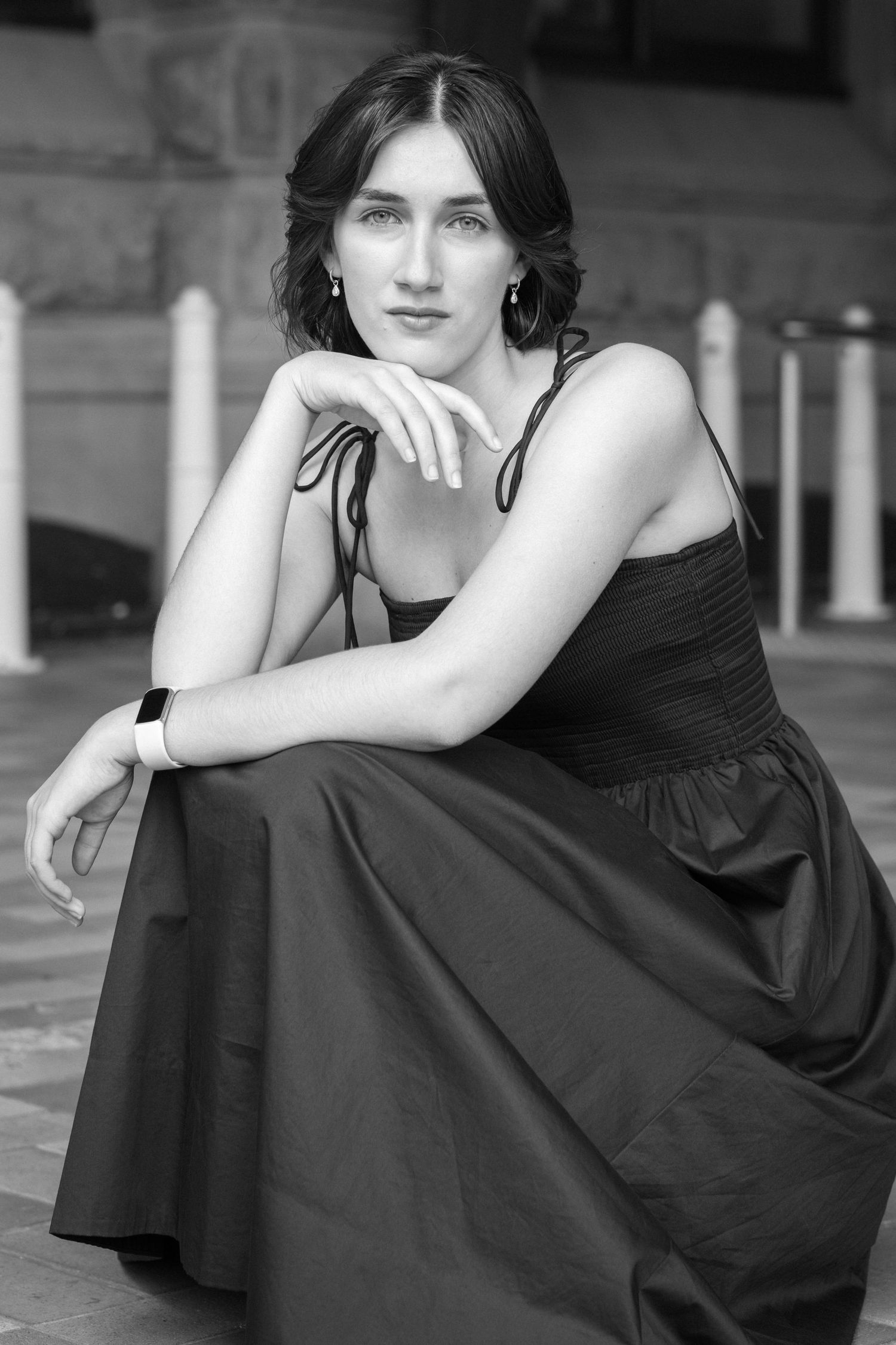 Environmental portrait of a woman at Central Station in Sydney using soft natural light.