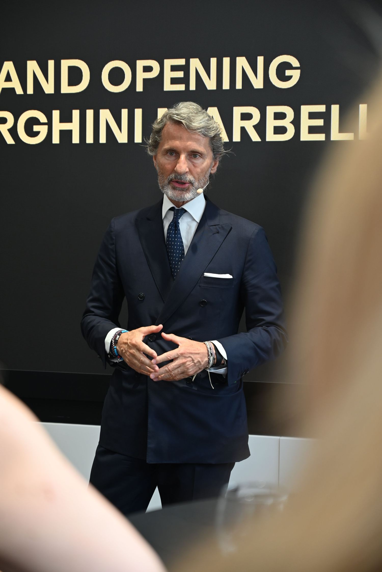 Stephan Winkelmann engaging with guests, showcasing Lamborghini’s commitment to its clients.