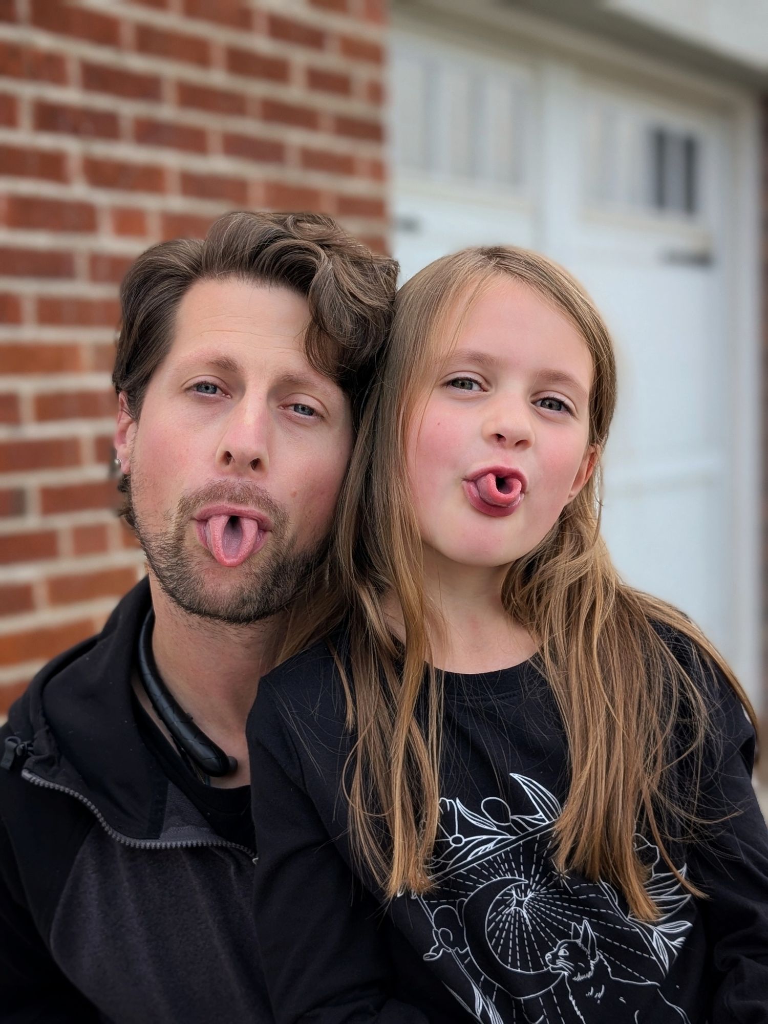 A series of playful photos showing two people making silly faces and sticking out their tongues together.
