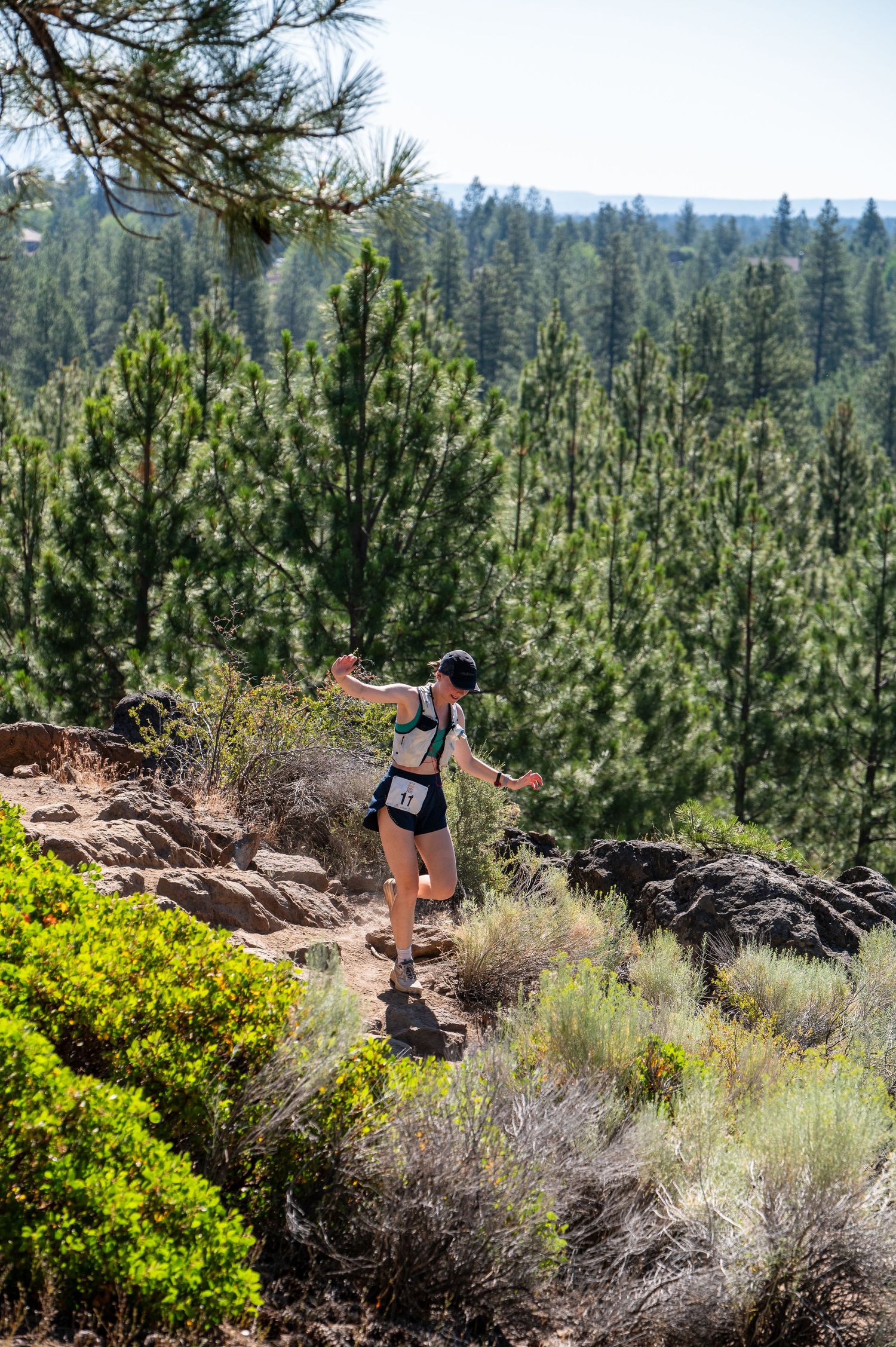 Trail runner racing Bend dirt fest half marathon captured by Eugene Oregon photographer Mike Norton.
