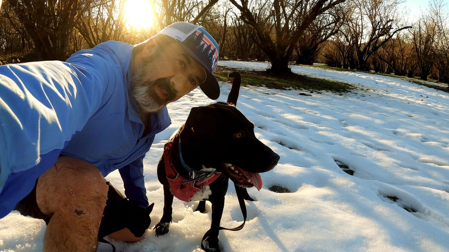 Eugene dog photographer Mike Norton with his dog Zoey on the snowy trails in Oregon.