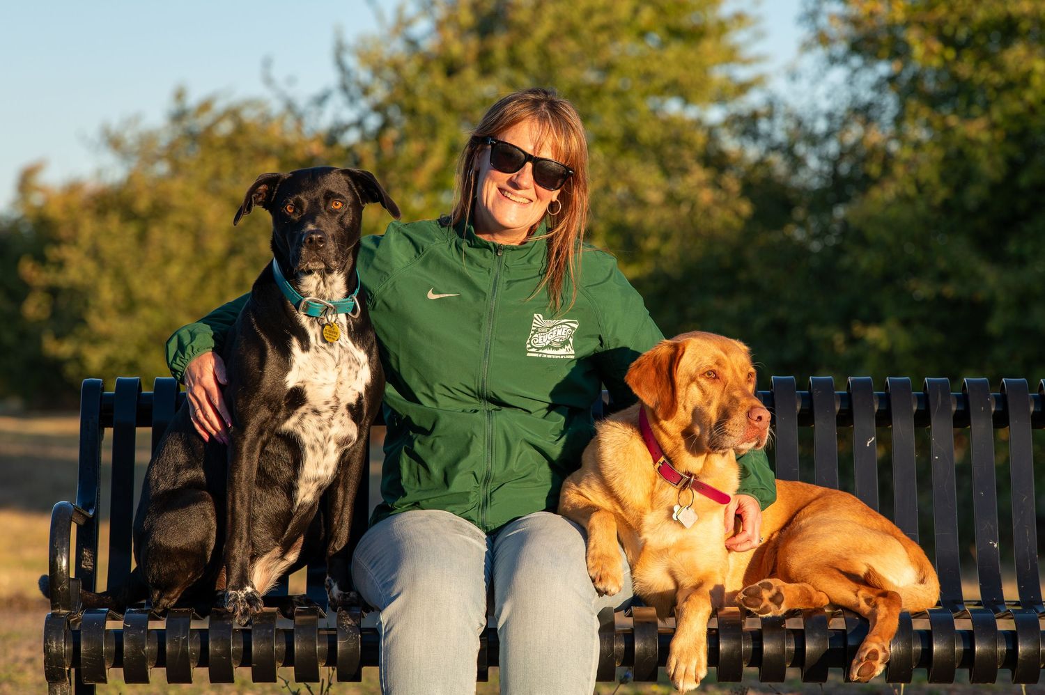 Lifestyle pet photography dogs and people at Golden Gardens park Eugene Oregon.