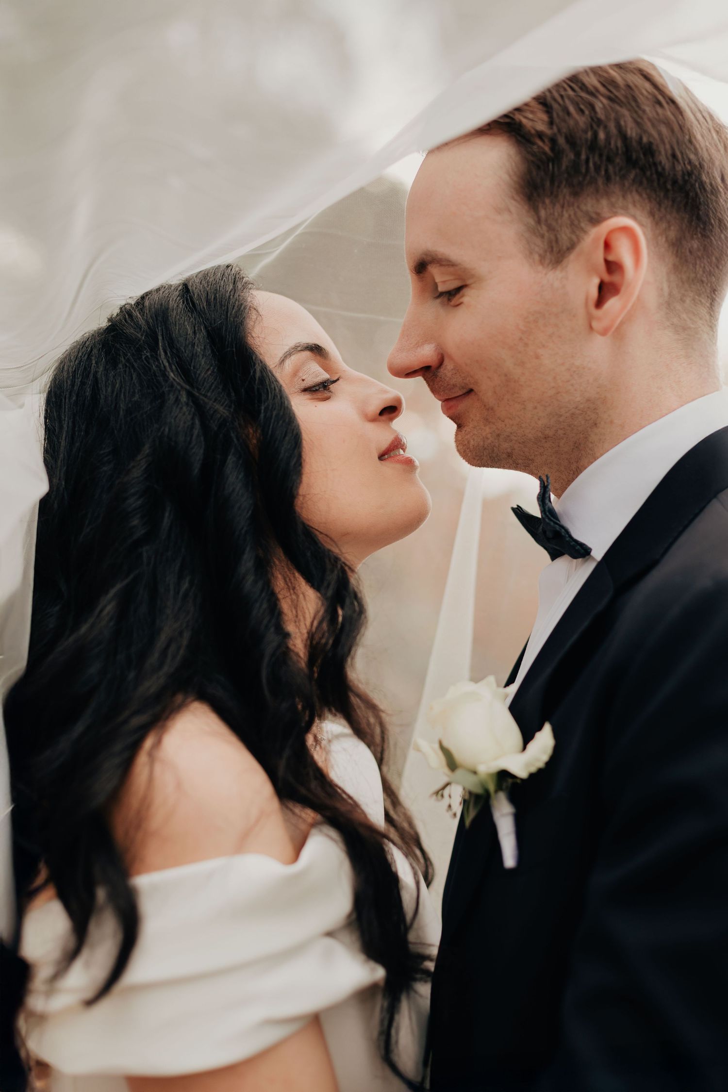 A romantic series of wedding portraits showing a couple in formal attire sharing intimate moments together.