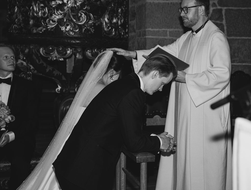 A series of black and white photos showing clergy members in white robes during a religious ceremony.