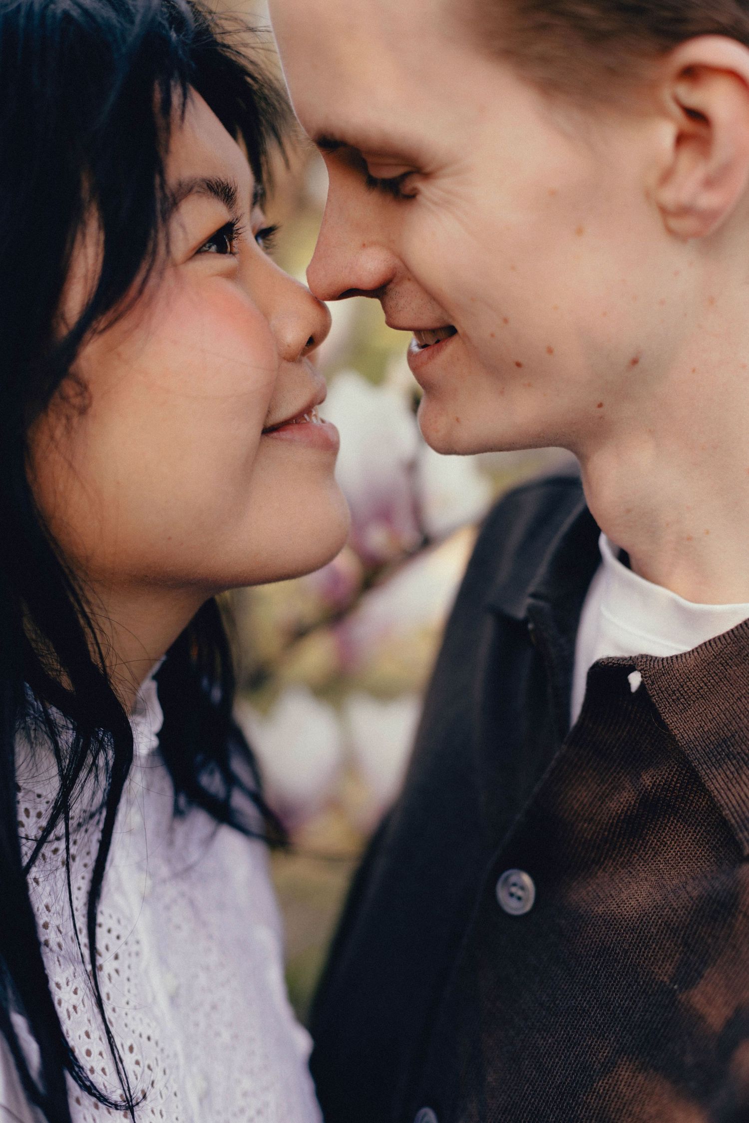 A romantic series of close-up shots showing a couple about to kiss in a tender intimate moment.