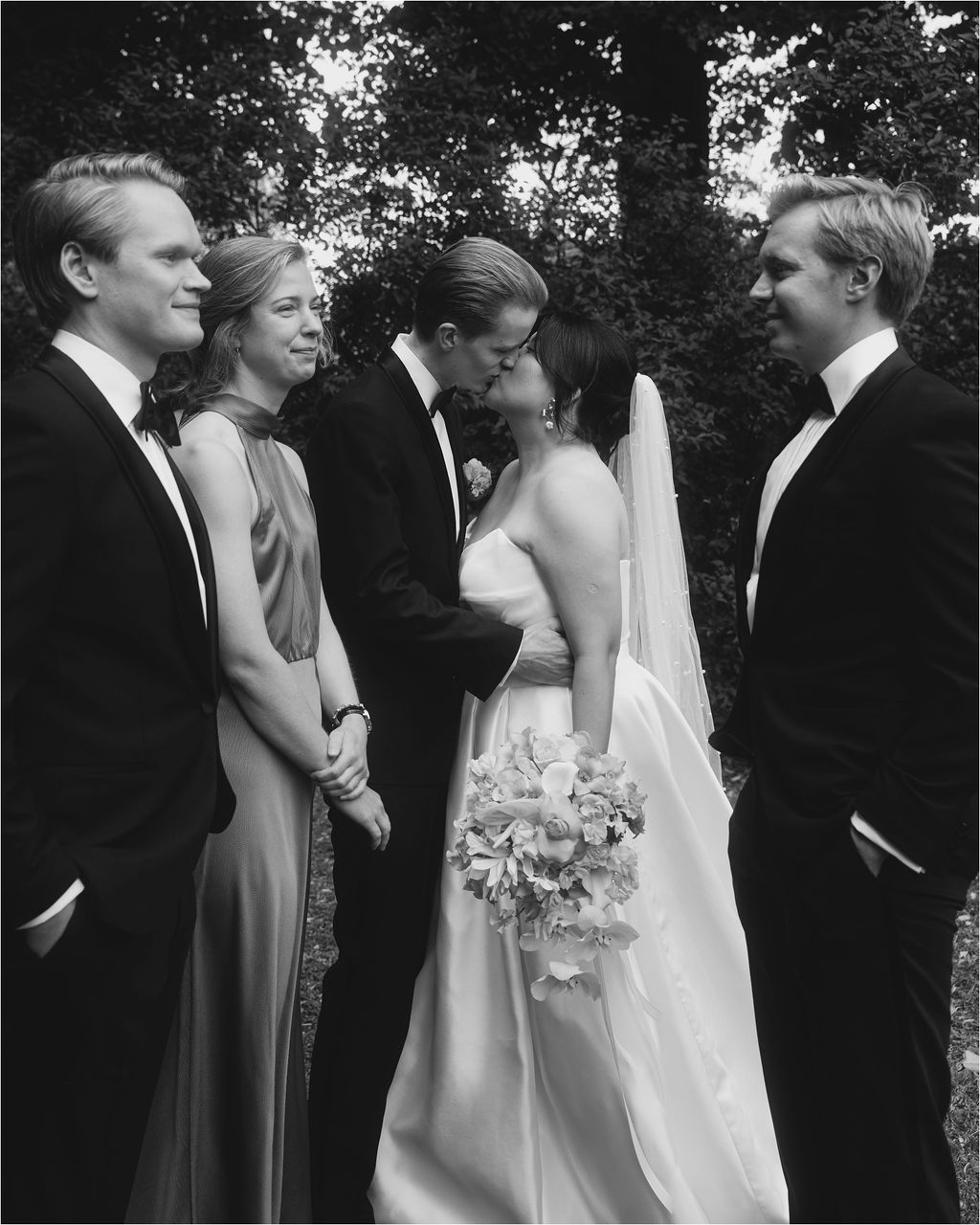 Black and white wedding party photos showing couples and bridesmaids in formal attire gathered outdoors.