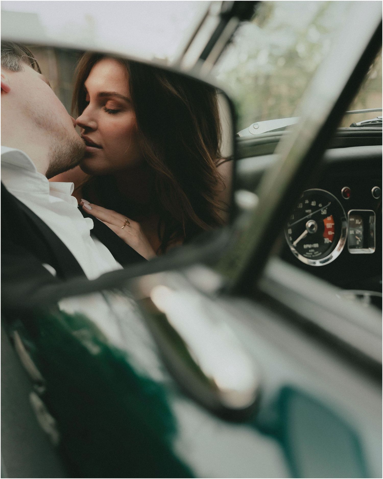 A person gazes out the car window in a moody, cinematic sequence of close-up shots.