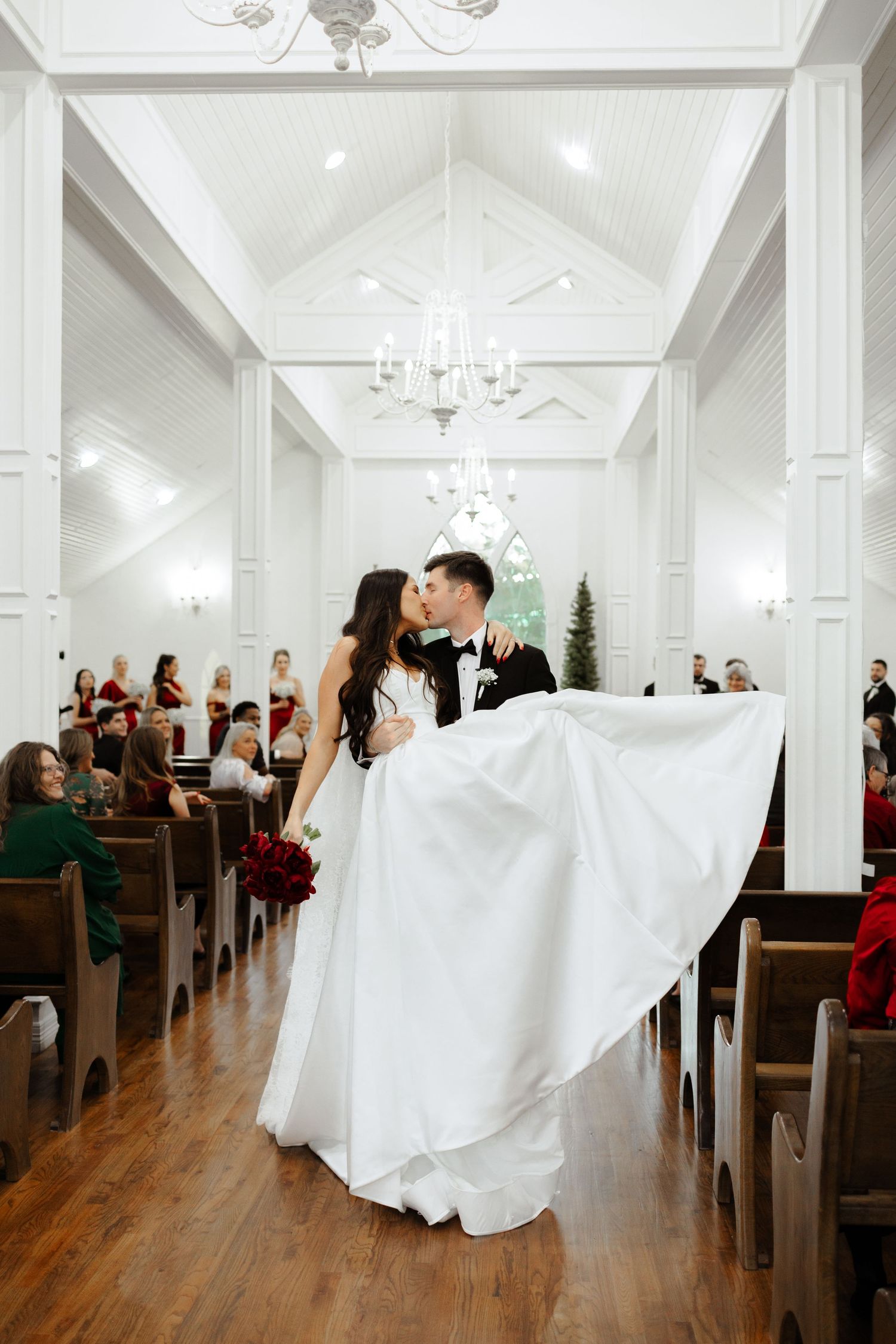 A sequence of motion shots capturing a white dress flowing through a bright church aisle with wooden pews.