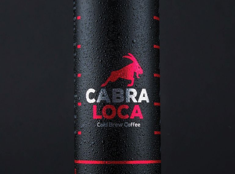 Cabra Loca Cold Brew Coffee can with red bull logo on sleek black condensation-covered aluminum packaging.