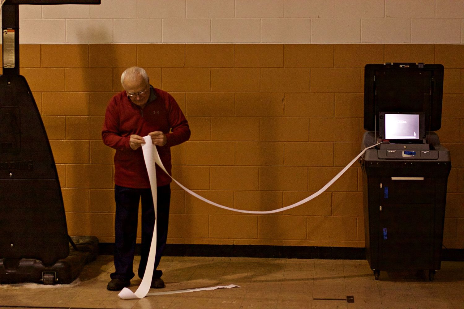 Dug McLarnan collects election results after the polls closed at 7 pm EST on election night IN Gambier, Ohio on Nov. 6, 2018. Election offic