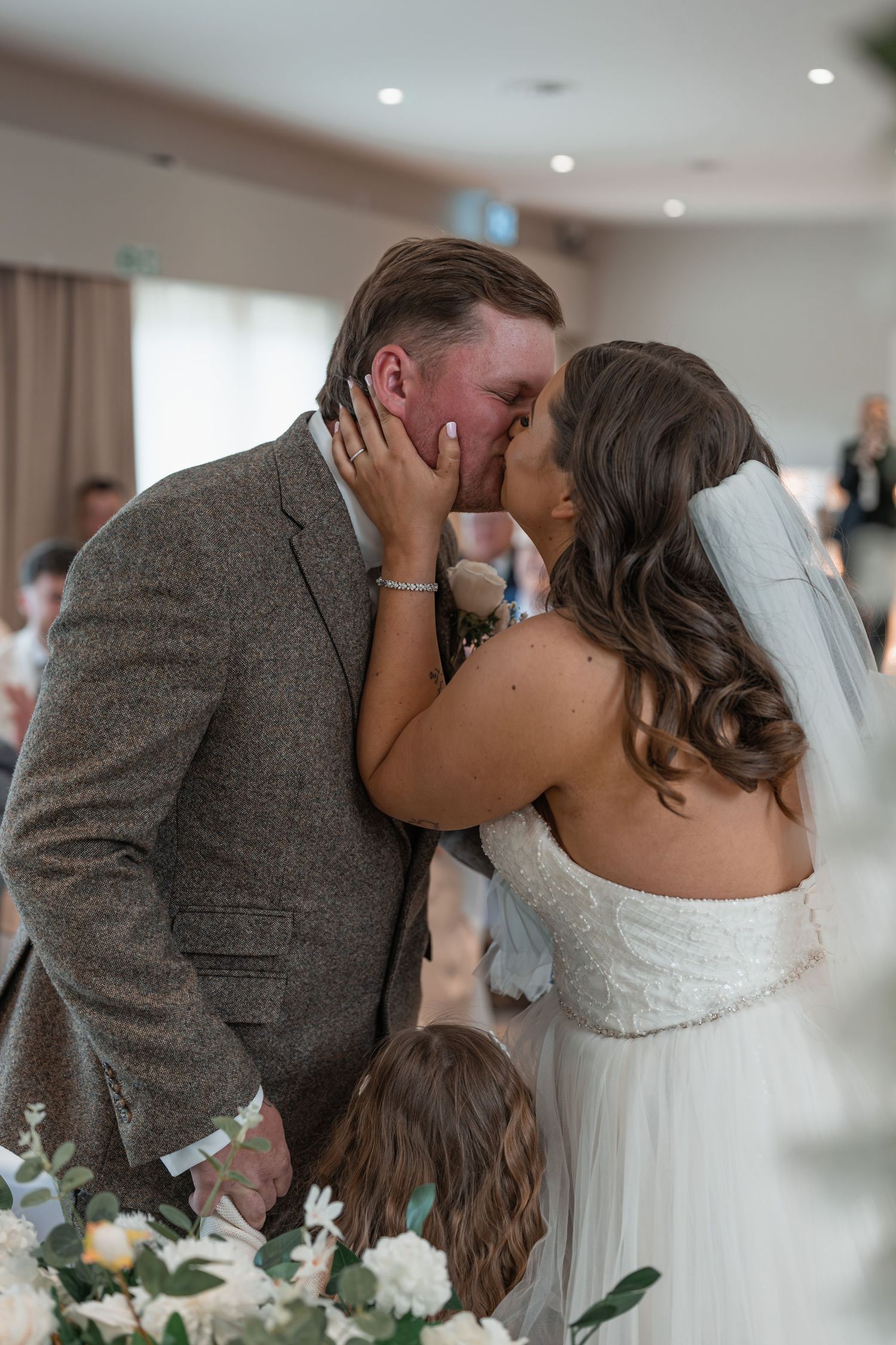 Essex bride and groom first kiss
