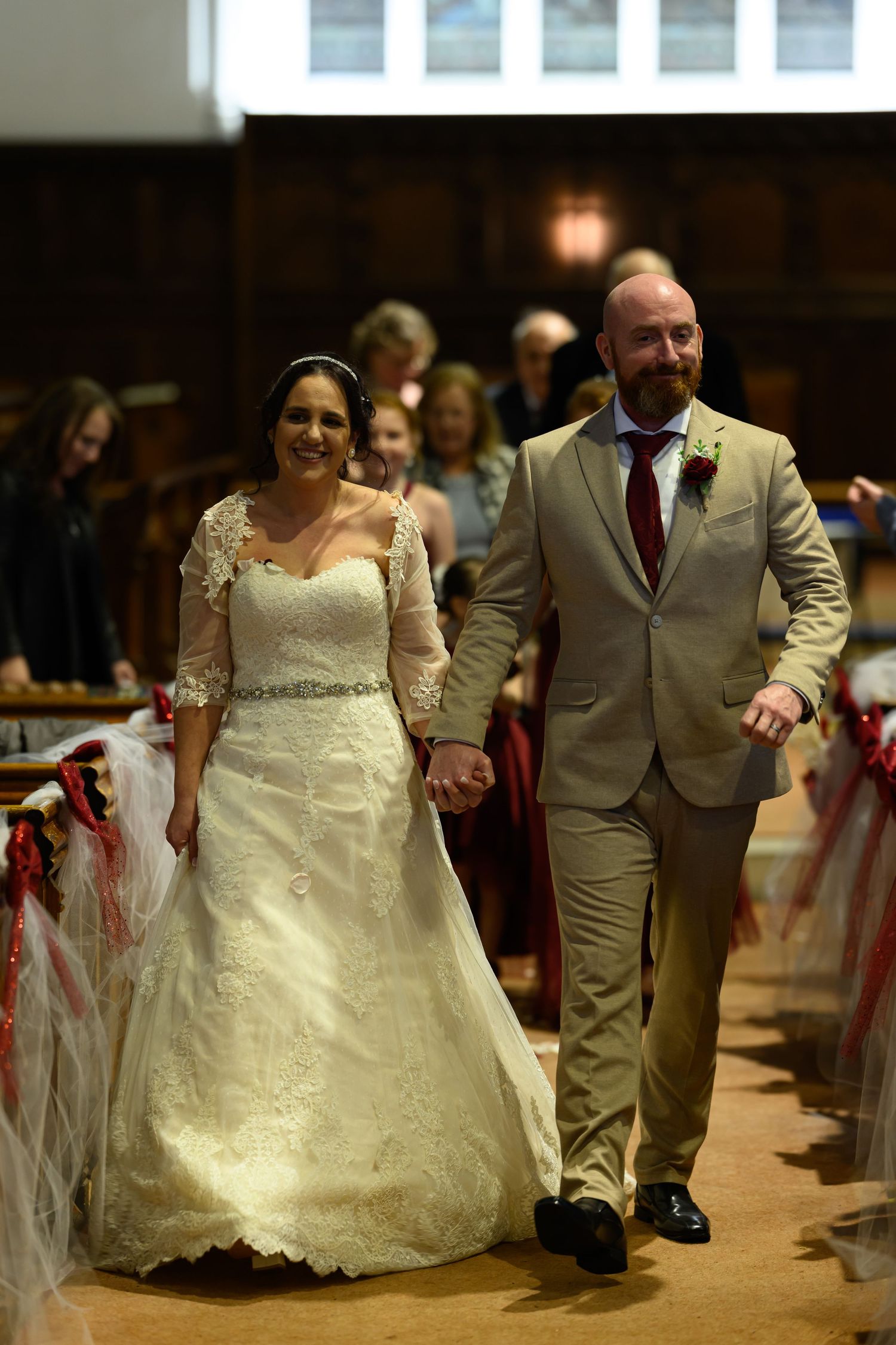 essex bride and groom walking down aisle church wedding
